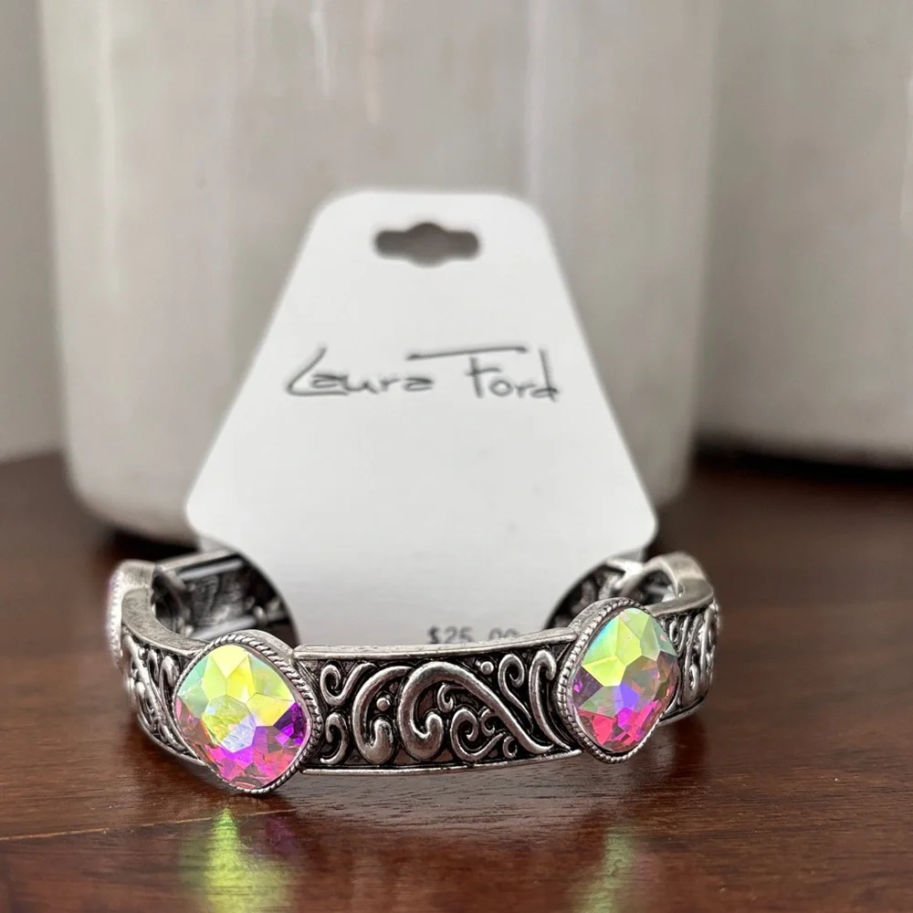 Laura Firs Stretch Embossed Silvertone w/iridescent beveled stones,stretch